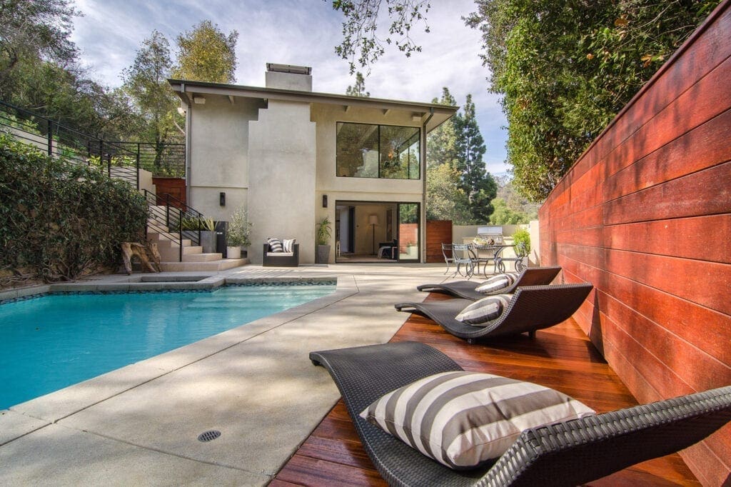 A pool with a lot of pillows on it