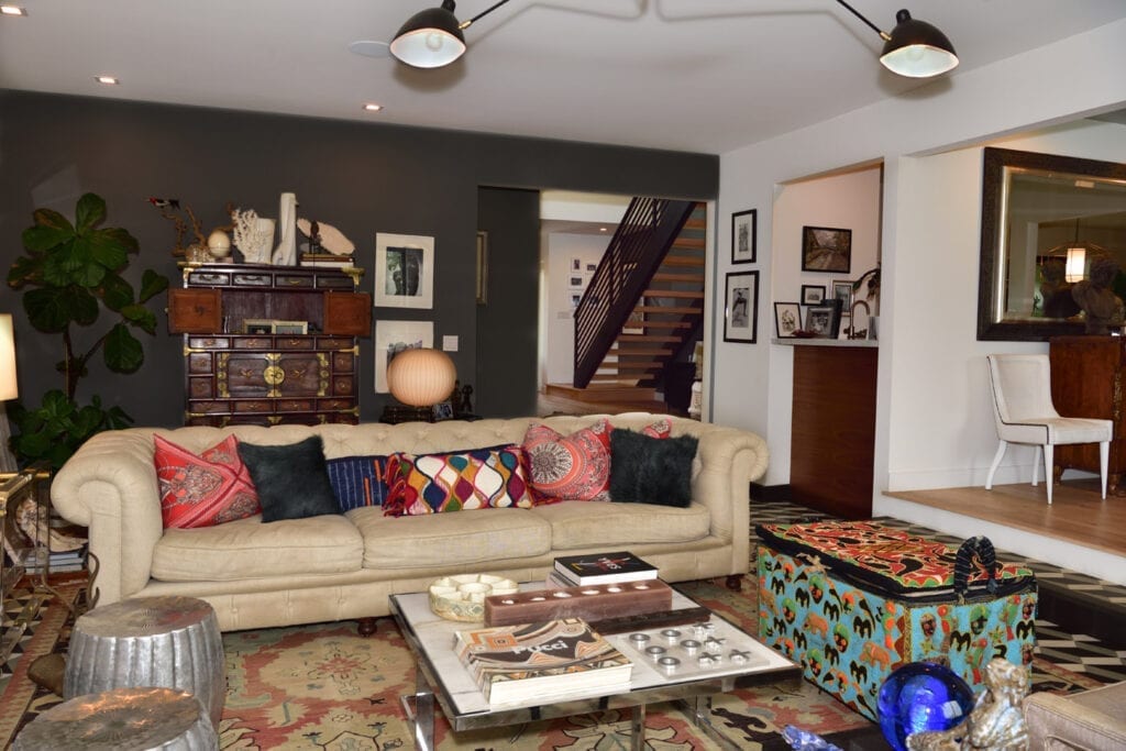 A living room with a couch and coffee table