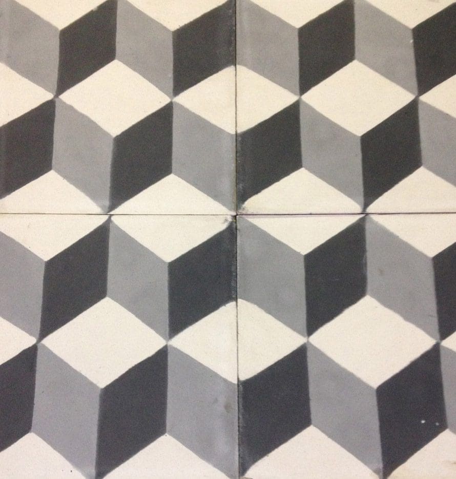 A close up of the floor tiles in a room