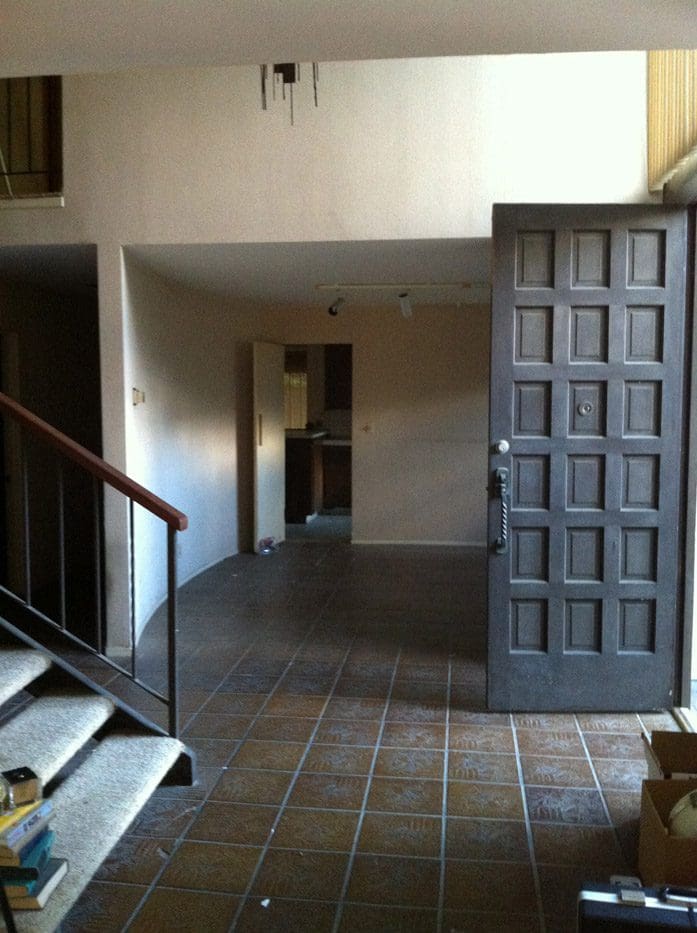 A door open to the inside of a house.