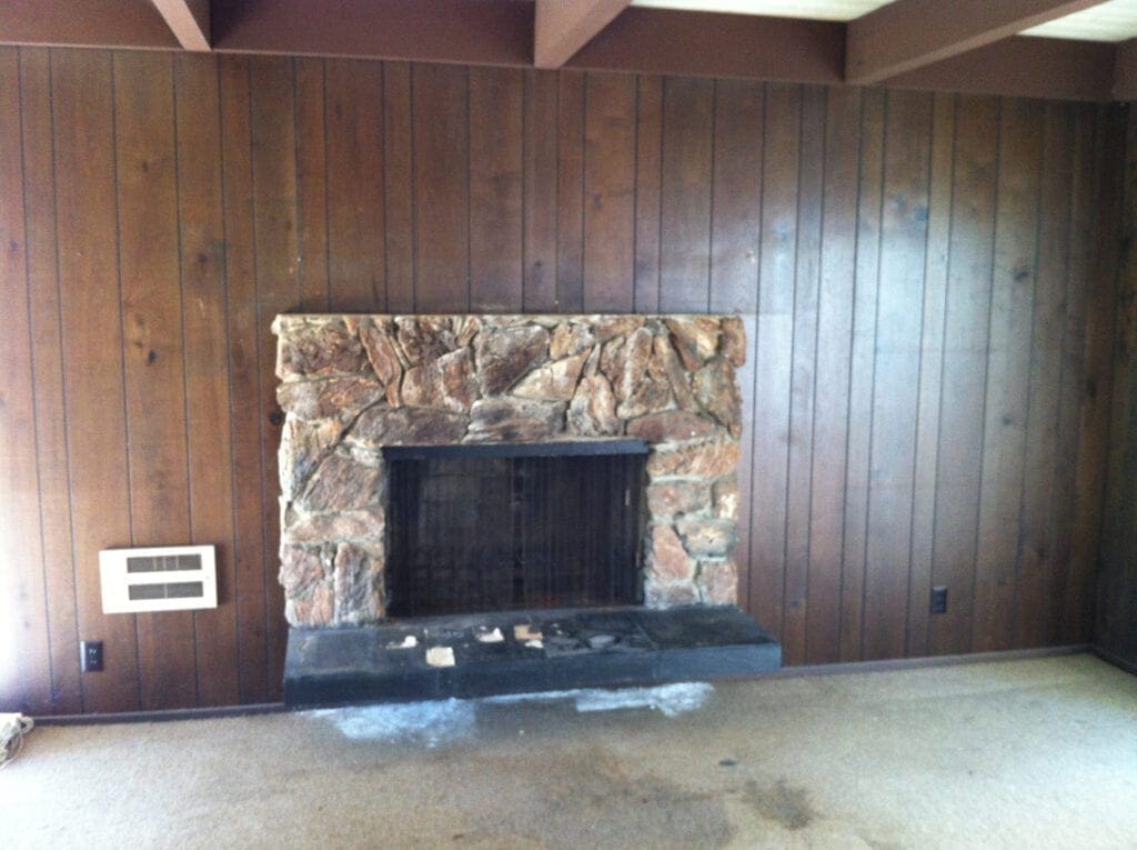A fireplace in the middle of a room.