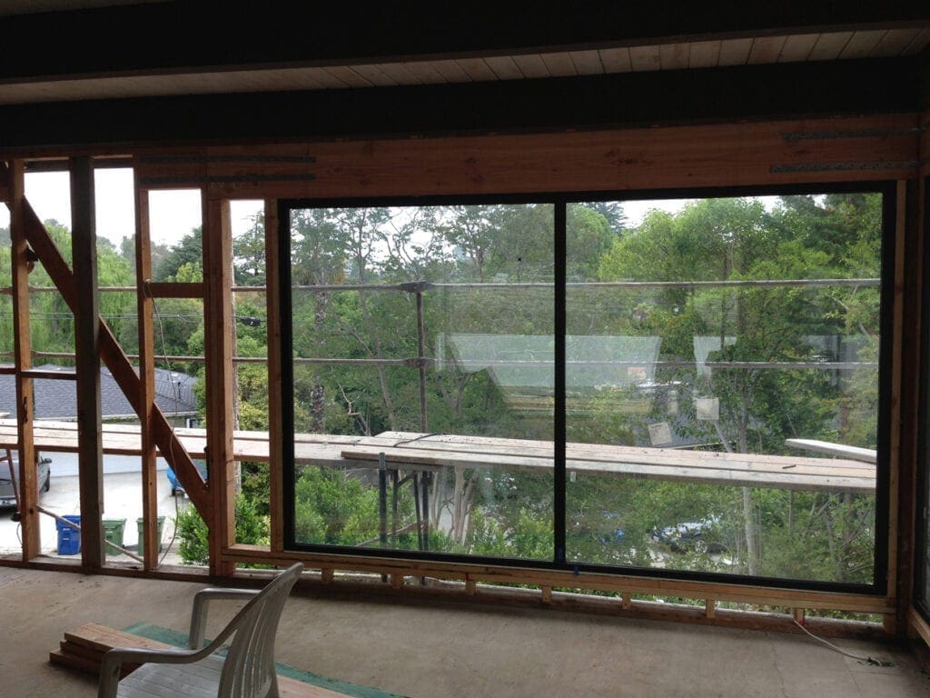 A view of trees from inside the house.