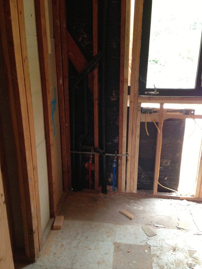 A room with some windows and doors in it