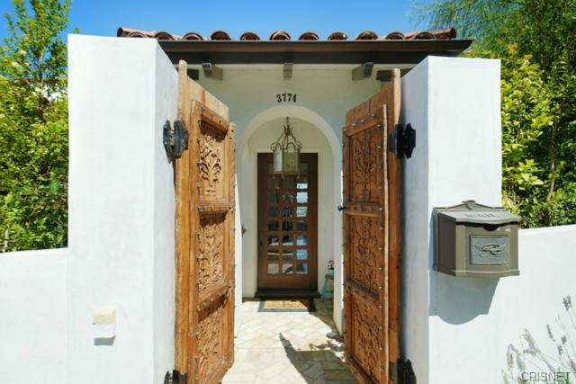 A couple of wooden doors open to the outside.