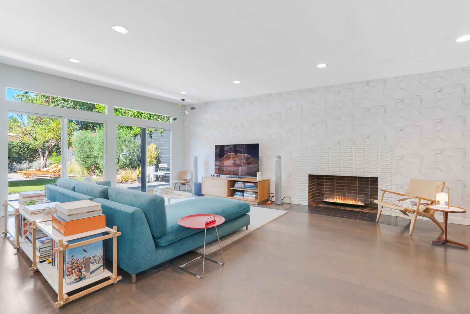 A living room with a couch and fireplace