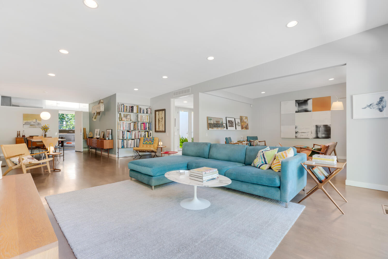 A living room with a couch and a table